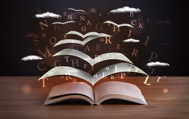 Pages and glowing letters flying out of a book