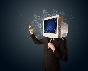 Computer monitor screen exploding on a young persons head