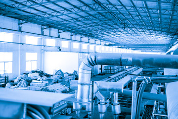 Naklejka premium Equipment, cables and piping as found inside