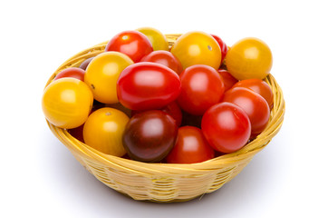 Different varieties of cherry tomatoes in a basket