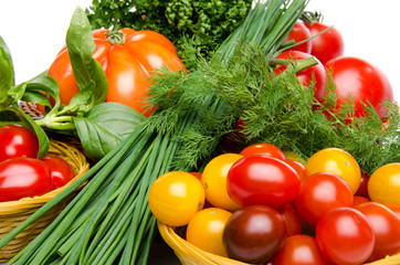 Composition of different varieties of tomatoes with herbs