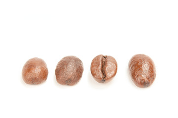 roasted coffee beans isolated on white background.