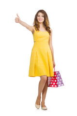 Woman after shopping spree on white