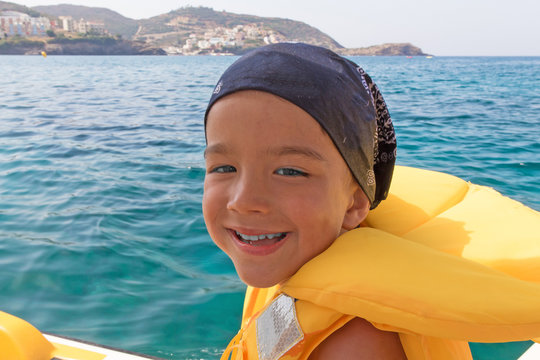 the child on the catamaran