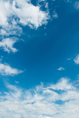 Cloudscape of bright blue sky
