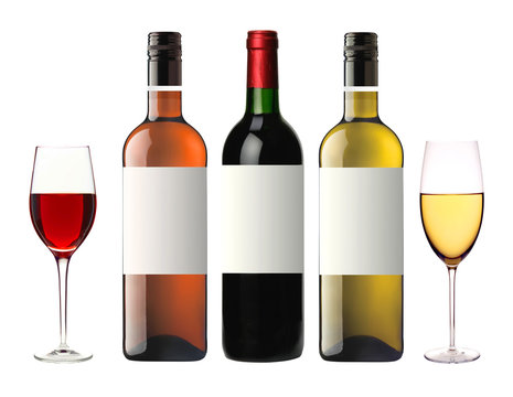 bottles of red, pink and white wine isolated on white