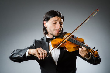 Man violin player in musican concept