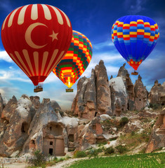 Hot air balloon flying mountain Hot air balloon flying mountain valley Göreme National Park and the Rock Sites of Cappadocia Turkey