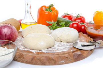 Ingredients to make a pizza