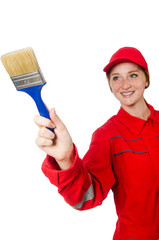 Woman painter in red coveralls isolated on the white