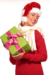 Christmas Santa hat  woman portrait hold christmas gift