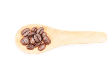 Wooden spoon with coffee beans  isolated on white background.