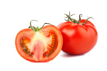 Tomatoes. Whole and a half isolated on white