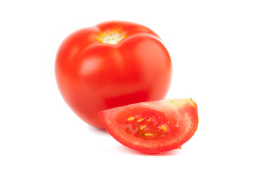 Tomatoes. Whole and a half isolated on white