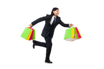 Man with shopping bags isolated on white