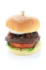 gourmet beefburger with goats cheese isolated