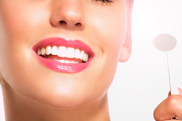 Closeup of smiling woman with perfect white teeth