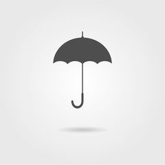 black icon of umbrella with shadow