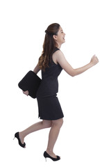 Fototapeta premium Young Pretty Businesswoman running