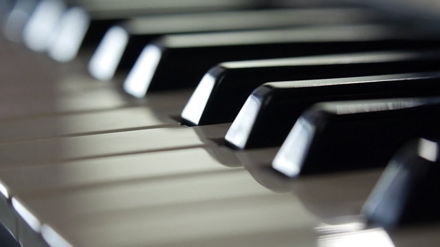 Piano keyboard background. Dolly Shot