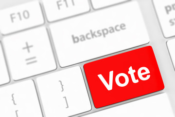 Fototapeta premium vote button on computer keyboard showing internet concept