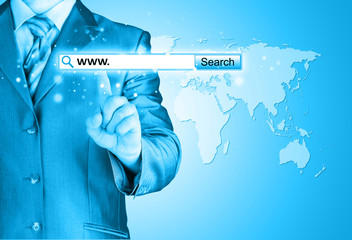 Businessman pushing virtual search bar