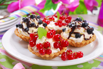mini tartlets with whipped cream and fresh fruits