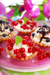 mini tartlets with whipped cream and fresh fruits