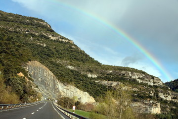 Rainbow over Pyrenees mountains Huesca Spain