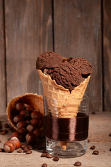 Tasty chocolate ice cream in waffle cone