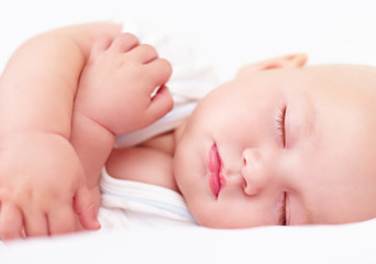 Fototapeta na wymiar beautiful infant baby sleeping, four months old