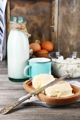 Dairy products and fresh eggs  on wooden background