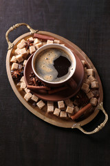Brown sugar, spices and cup of coffee