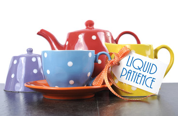 Tea set and tea cup with Liquid Patience sign