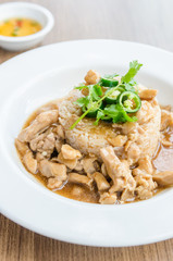 Chicken with brown sauce on rice