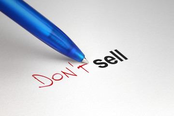 Don't sell. Written on white paper