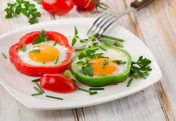 Healthy breakfast - fried eggs with paprika. Selective focus