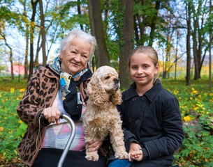 Grandmother and child sitting on the bench