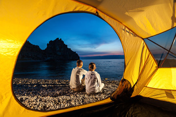 Couple sits near tent - 68056878