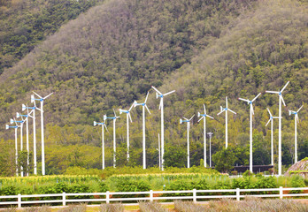 Fototapeta na wymiar landscape of eco windmill turbines fan in agriculture farm for