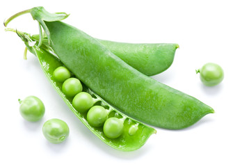 Fresh peas are contained within a pod.