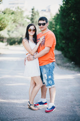 Happy couple posing in the park