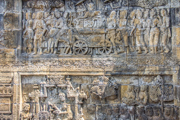 Ancient carvings in the wall of Borobudur Indonesia