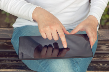 Woman using digital tablet computer