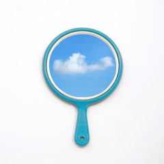 hand mirror with reflection of blue sky, cloud isolate on white