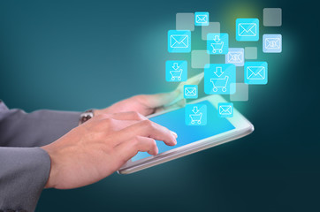 Business man holding credit card and press key for shopping onli