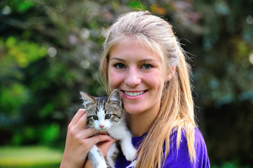 Teen girl and kitten