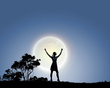 Woman and full moon