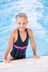 Cute little girl in swimming pool