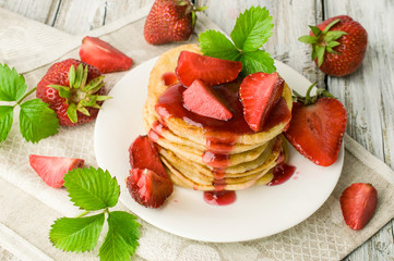pancakes with jam and fresh strawberries